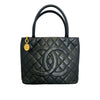 Mademoiselle Vintage Flap Bag in black and beige shiny sheepskin leather
