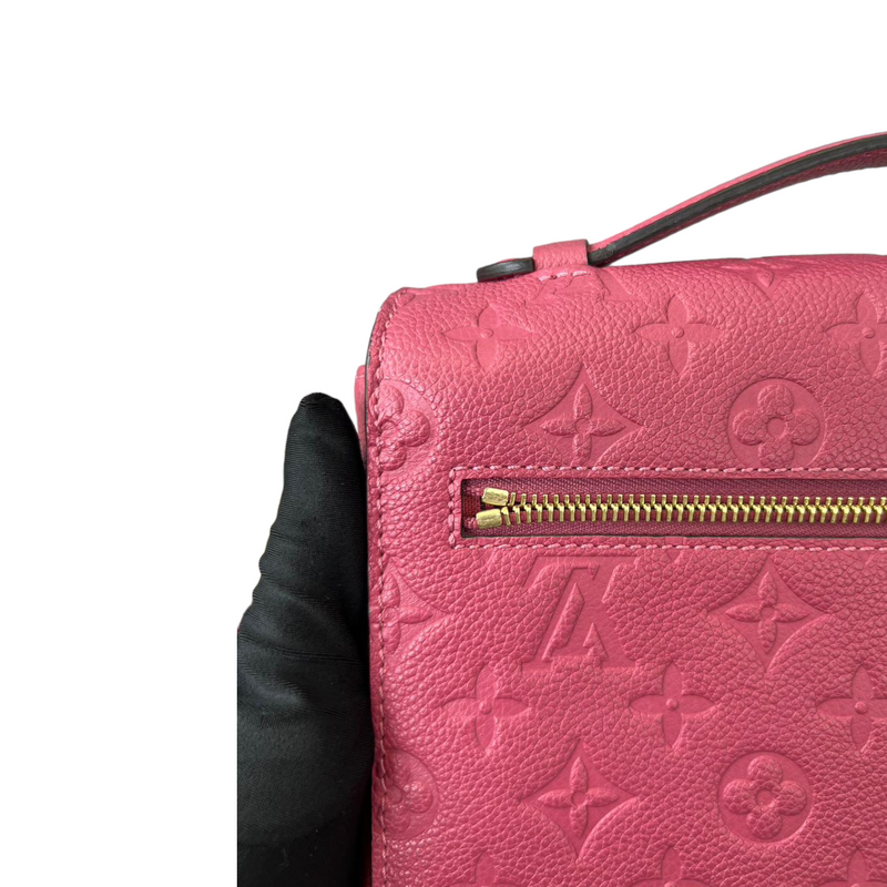 Louis Vuitton Reveal: Monogram Empreinte Pochette in Rose