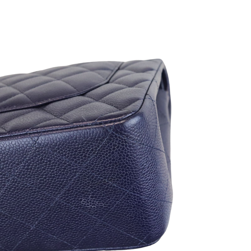 Caviar Quilted Jumbo Double Flap Dark Blue SHW