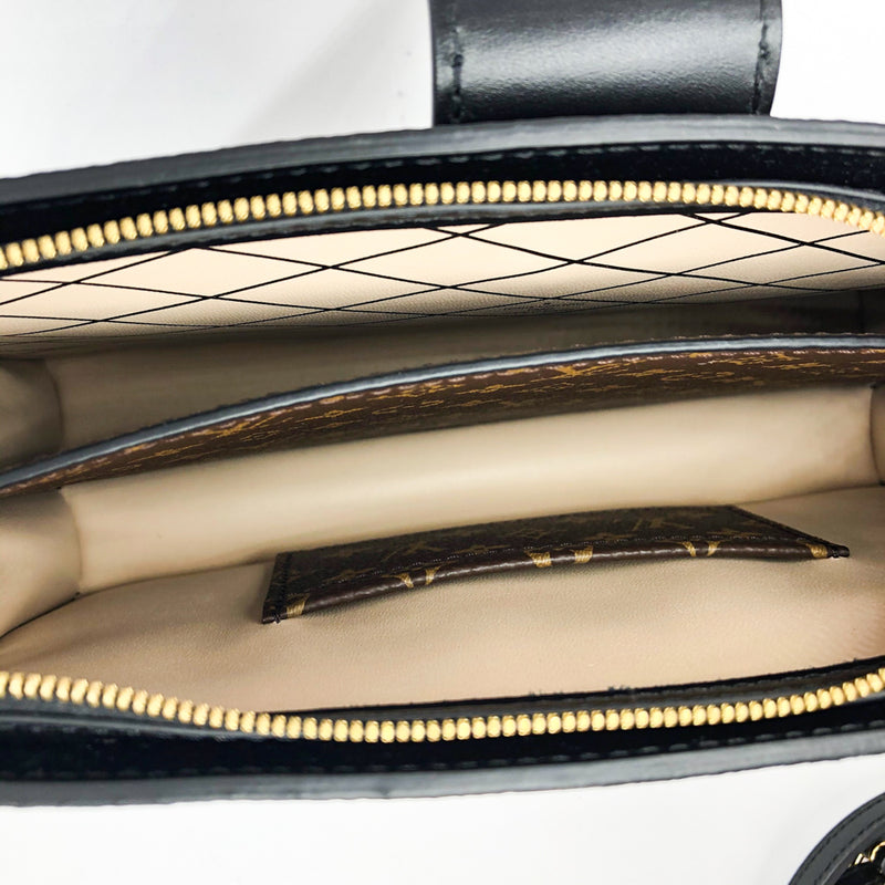 Louis Vuitton Monogram Reverse Trunk Clutch Bag – The Closet