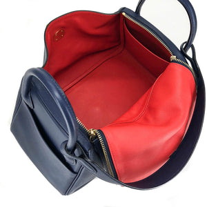 Lindy 30 in Blue Nuit with Rouge Tomate Interior