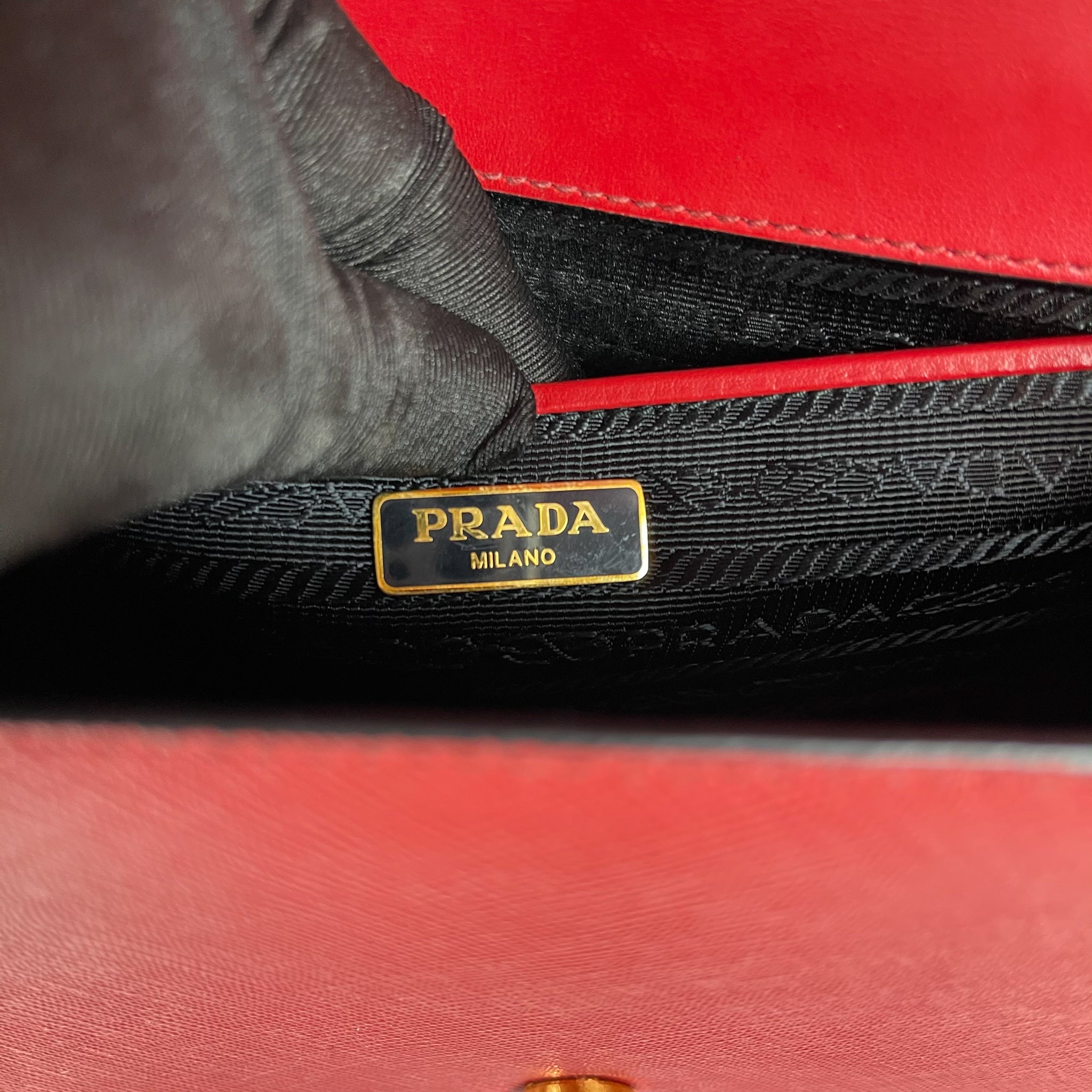 Prada red sling bag on sale