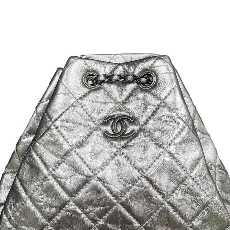 bag, chanel gabrielle backpack, backpack, metallic, silver, ring, skirt,  accessory, chanel bag, chanel - Wheretoget