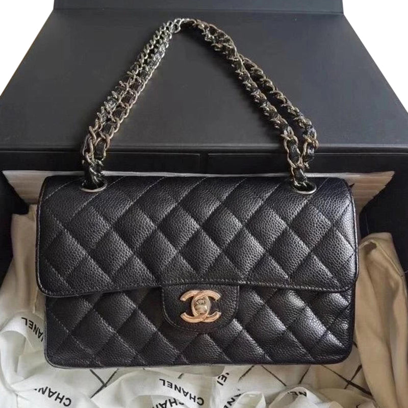 Roseberys London | Chanel: a small black leather tote bag, with faux