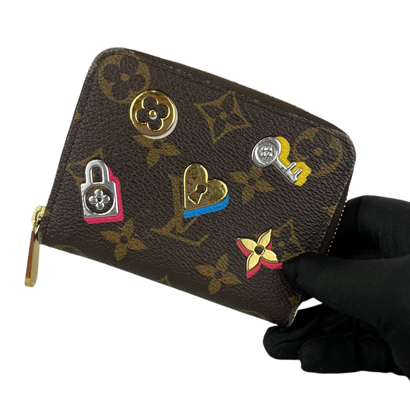 Louis Vuitton Limited Edition Love Lock Zippy Coin Wallet (ROR) 144010 –  Max Pawn