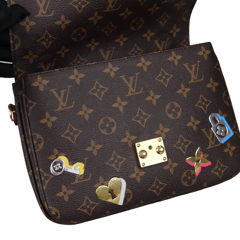 Louis Vuitton Pochette Methis MM Monogram Love Lock Gold Handbag